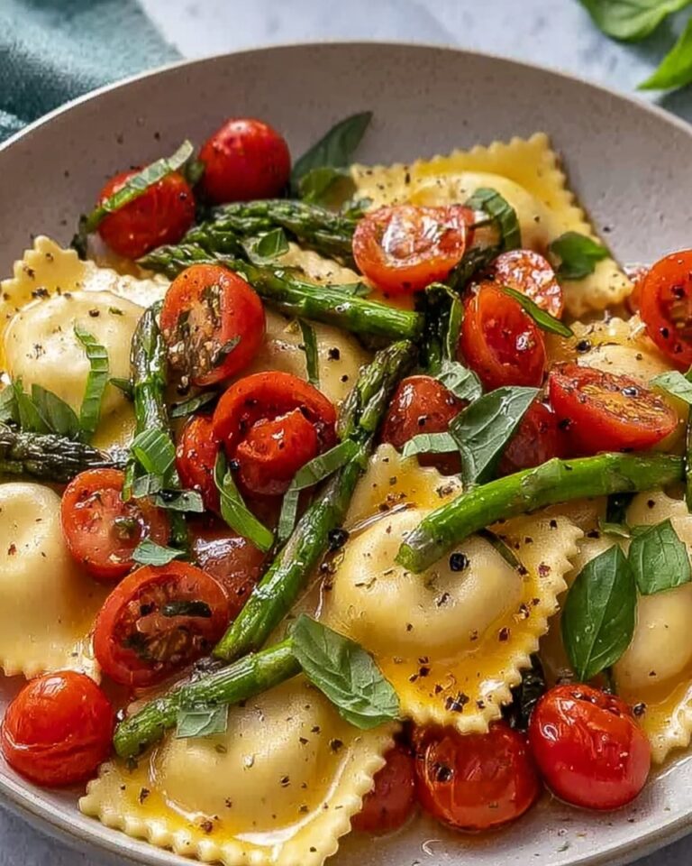 Ravioli with Tomatoes, Asparagus, Garlic, and Herbs Recipe